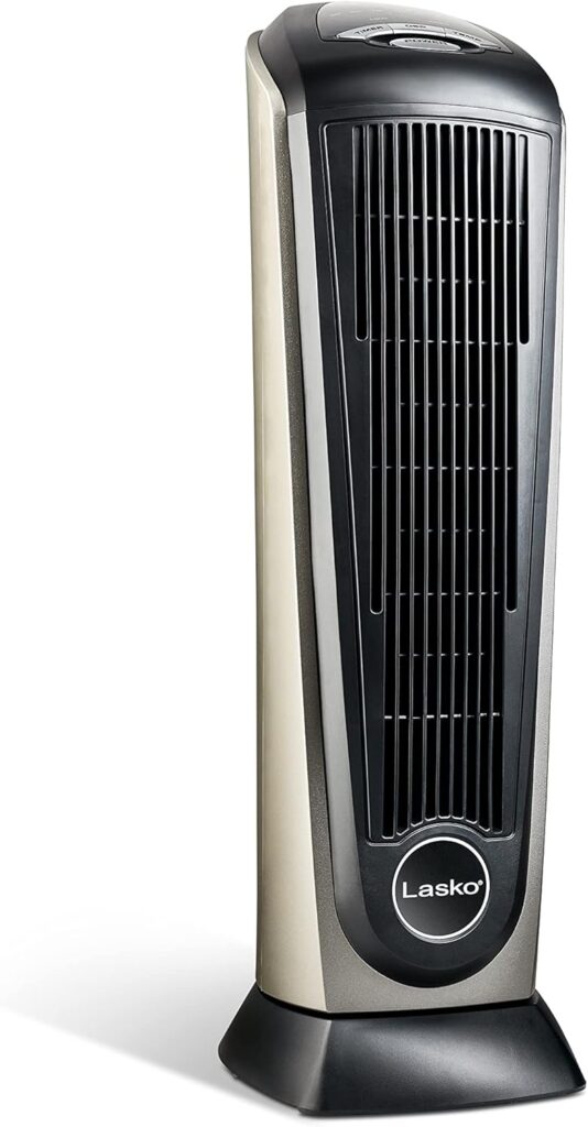 Lasko Oscillating Ceramic Tower Heater – A sleek, black and silver space heater with a modern tower design, featuring front-facing vents and control buttons on the top for easy operation.