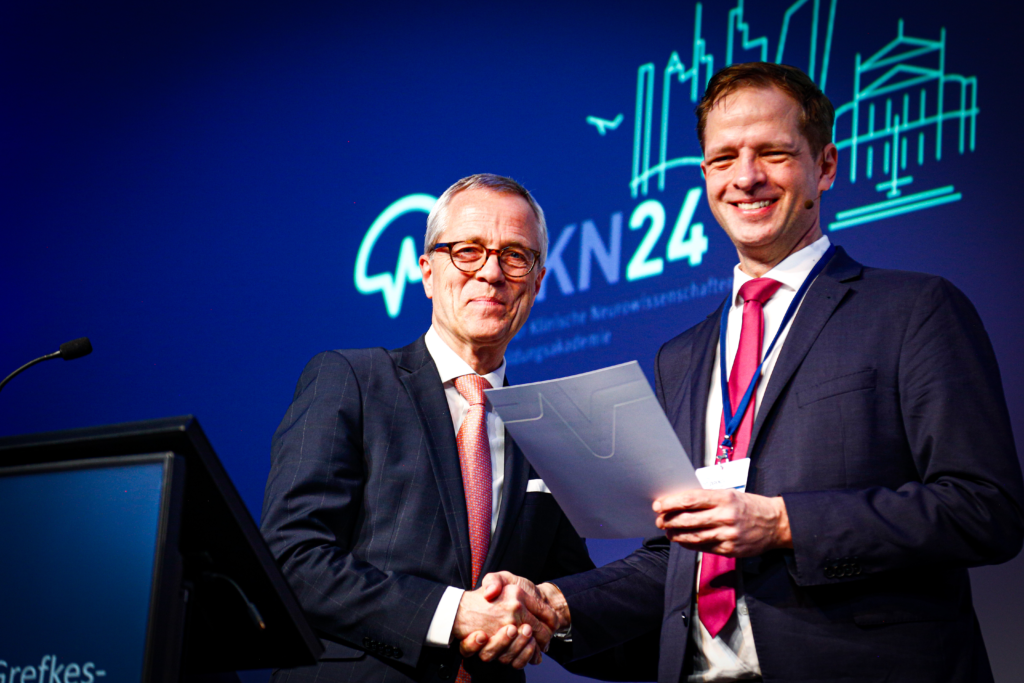 Keynote speaker presenting groundbreaking research at DGKN Congress 2025, highlighting the latest advancements in clinical neuroscience.